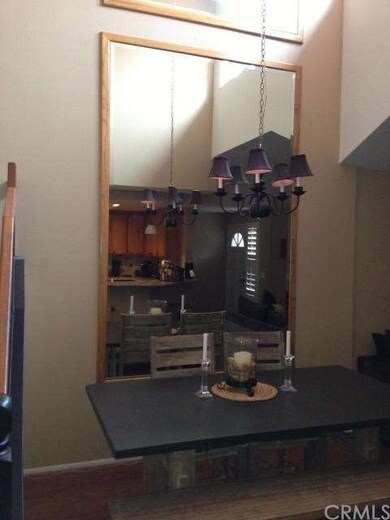 Dining Room with Cathedral Ceiling and Hardwood Fl