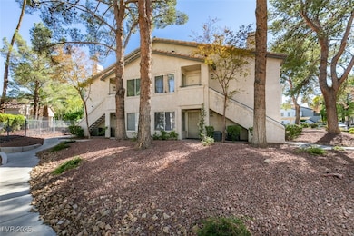 View of property featuring stairway