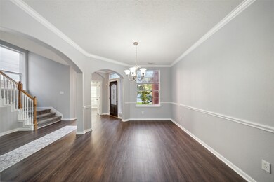 This is a spacious, well-lit dining room with eleg