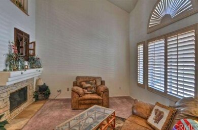 Upgraded stone fireplace and plantation shutters m