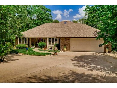 Exterior Front. Large driveway with 