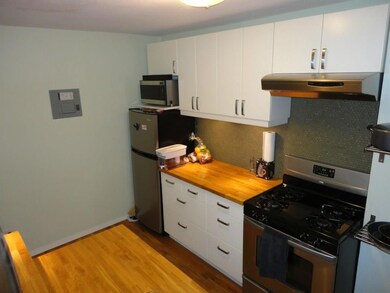 Kitchen featuring appliances with stainless steel