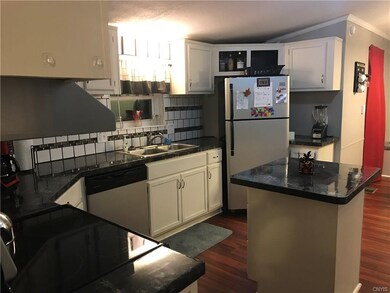 Fully applianced eat-in kitchen w/ island & pantry