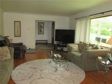 Large formal living room with front picture window