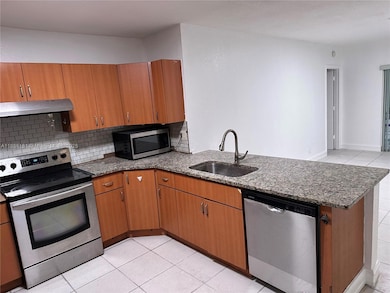 3751 NW 115th Ave unit B, Coral Springs, FL 33065 - photo 2