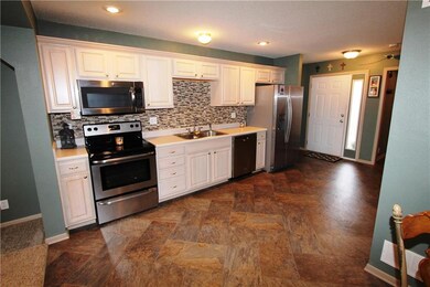 Kitchen with new backsplash & appliances