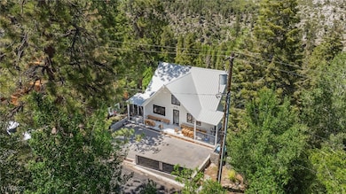 Aerial view of property and surrounding area with