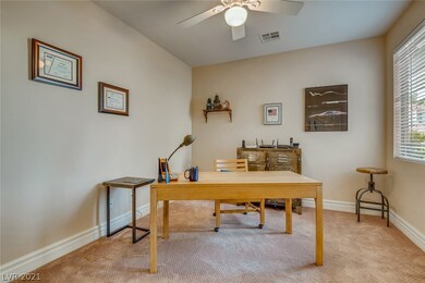 Office off of entry with double doors