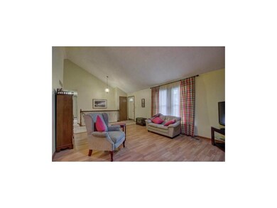 View of entry and Living Room from fireplace.