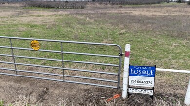 View of large gate, big enough for farm equipment
