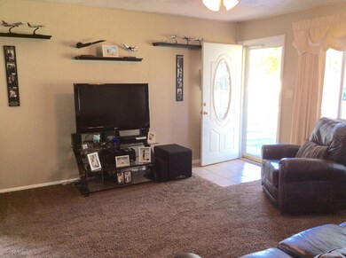 Living room with beautiful entry door