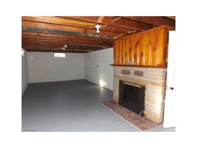 BASEMENT WITH FIREPLACE