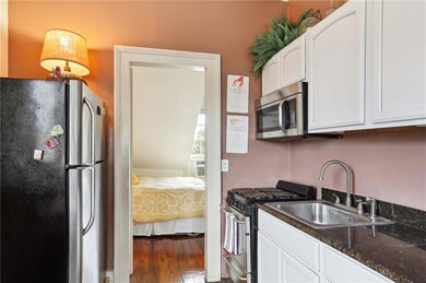 Petite kitchen with gas range