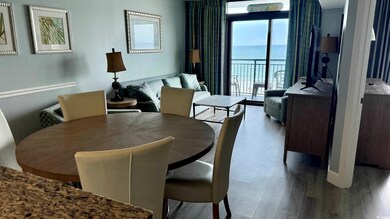 Dining room featuring wood finished floors