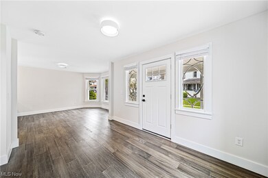 Entrance foyer with hardwood floors