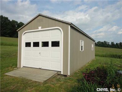 Garage. One car detached garage plus extra space f