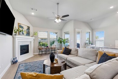 Living room with light hardwood / wood-style floor