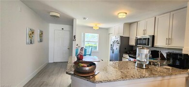 1330 Derbyshire Ct unit 203, Naples, FL 34116 - photo 5