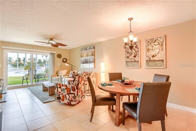 Living dining area with great views of the pool an