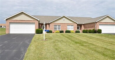 Beautiful Brick Condo with 2 car attached garage