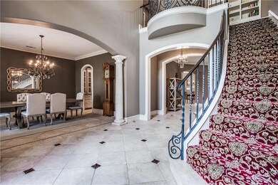 Sweeping stair case enhances the entry