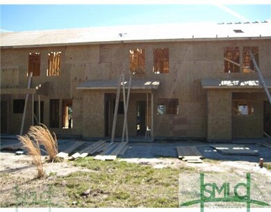 Exterior Back. Back of the town home under constru