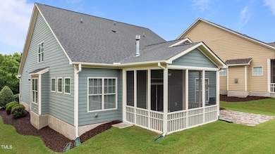 Backyard with screened porch and patio