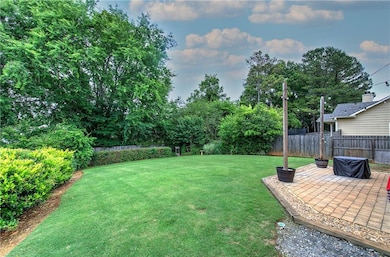 View of yard with a patio area