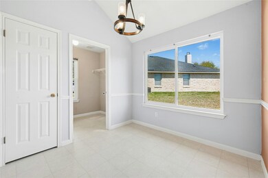 Unfurnished dining area with baseboards, lofted c