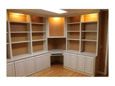 Executive Office/Suite. All wooden built ins.