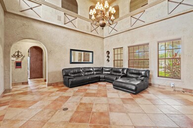 Living area with soaring 25 ft ceilings