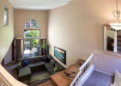 Sliding glass door right off living room to cozy p