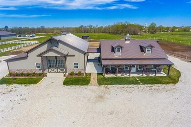 Stunning all steel covered buildings....circle drive for easily handling trailers whether you are coming from or going to a horse show!