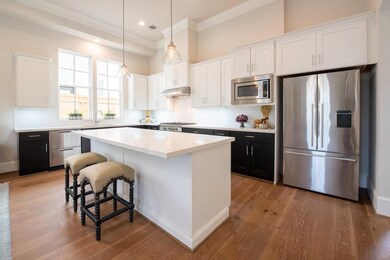 Similar kitchen with contrasting uppers and lower