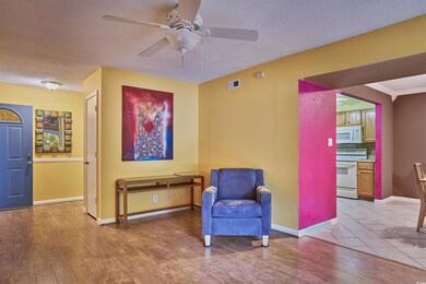 Sitting room featuring light hardwood / wood-style