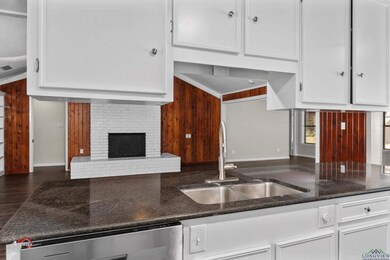 Kitchen featuring tasteful backsplash, sink, a fir