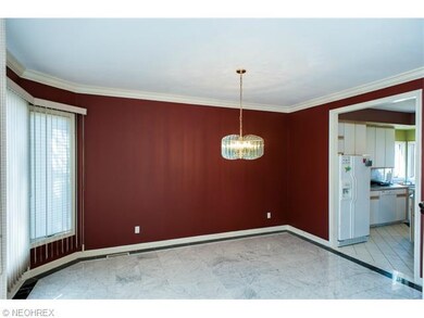 The marbled floor and tray ceiling make dining a f