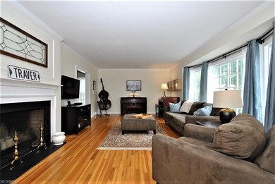 Spacious living room with beautiful woodburning fi