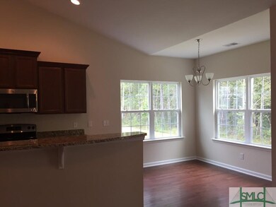 Breakfast area with private woods view