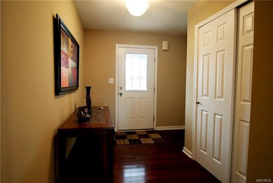 Entryway with hardwood floors