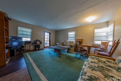 LIVING ROOM OF THE FRONT UNIT