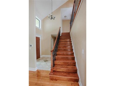 Vaulted Entry, Custom Tile & Gorgeous Stairway