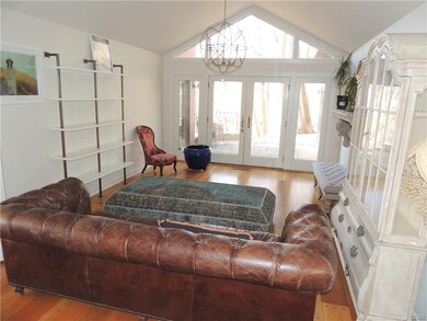 Study with vaulted ceiling, also can double as lar