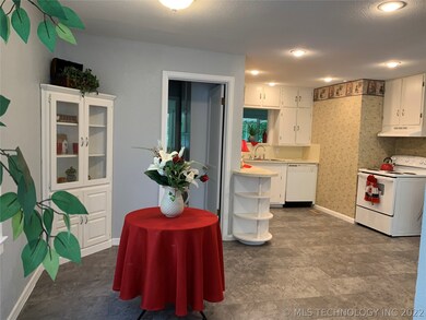 Dining Area Flows Into the Kitchen.  New Vinyl Flo
