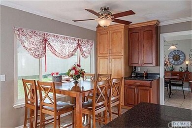 Kitchen nook with ceiling fan light  enjoy snacks 
