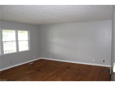 Huge Living Room (19 x 15) with hardwood flooring.