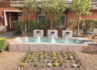 BEAUTIFUL GATED COMMUNITY WITH LUSH LANDSCAPING.