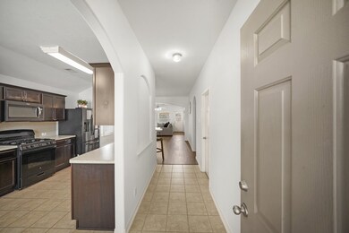 As you enter, you are greeted into foyer and kitch