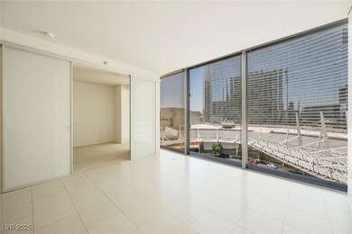 Spare room featuring floor to ceiling windows and