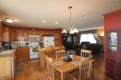 Dining area with slide door out to the back covere